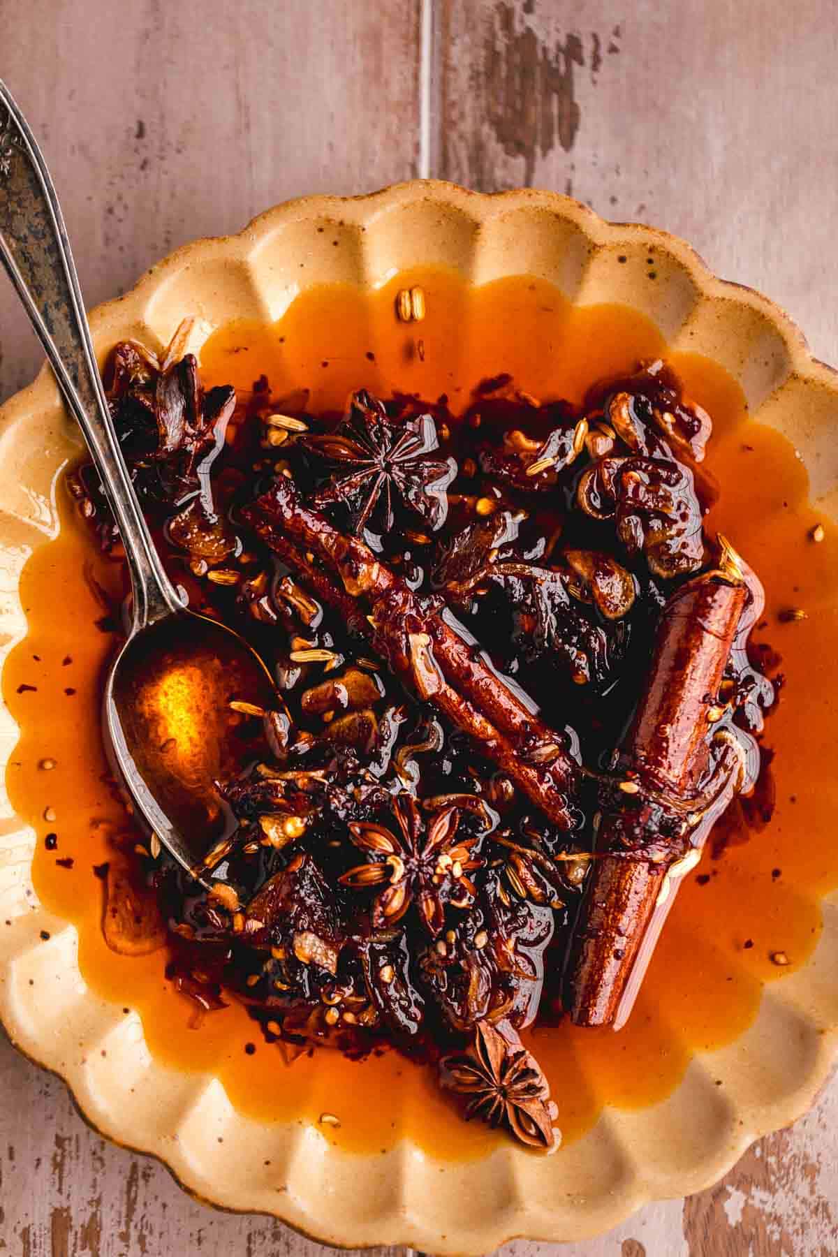 Garlic Chili Oil on a plate with a spoon.