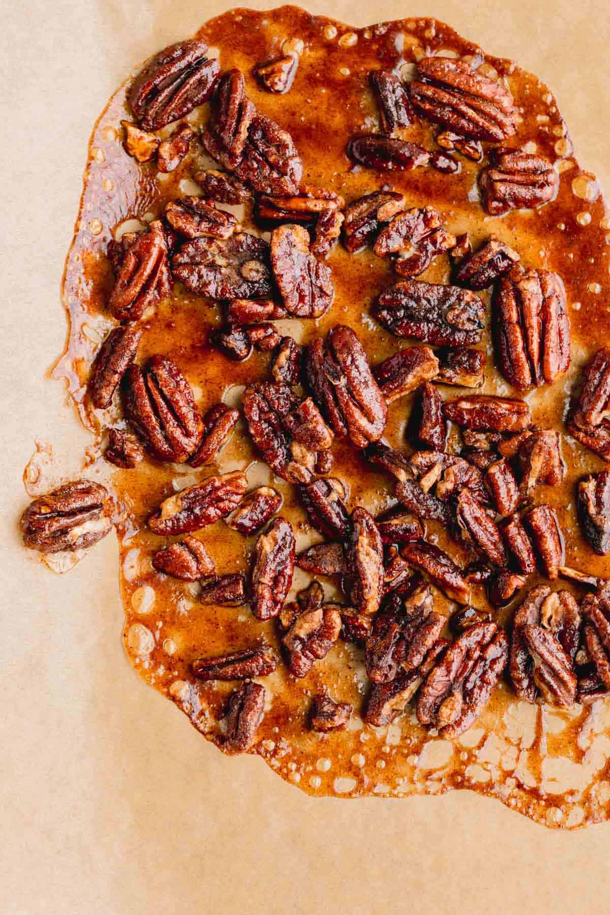 Candied pecans on a sheet tray. 