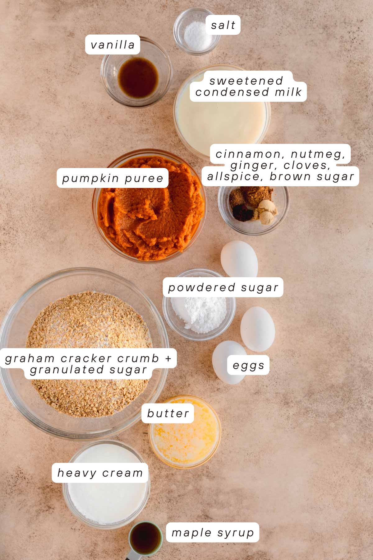 Salt, vanilla, sweetened condensed milk, pumpkin puree, nutmeg, cinnamon, cloves, allspice, ginger, heavy cream, powdered sugar, brown sugar, graham cracker crumbs, eggs and butter.