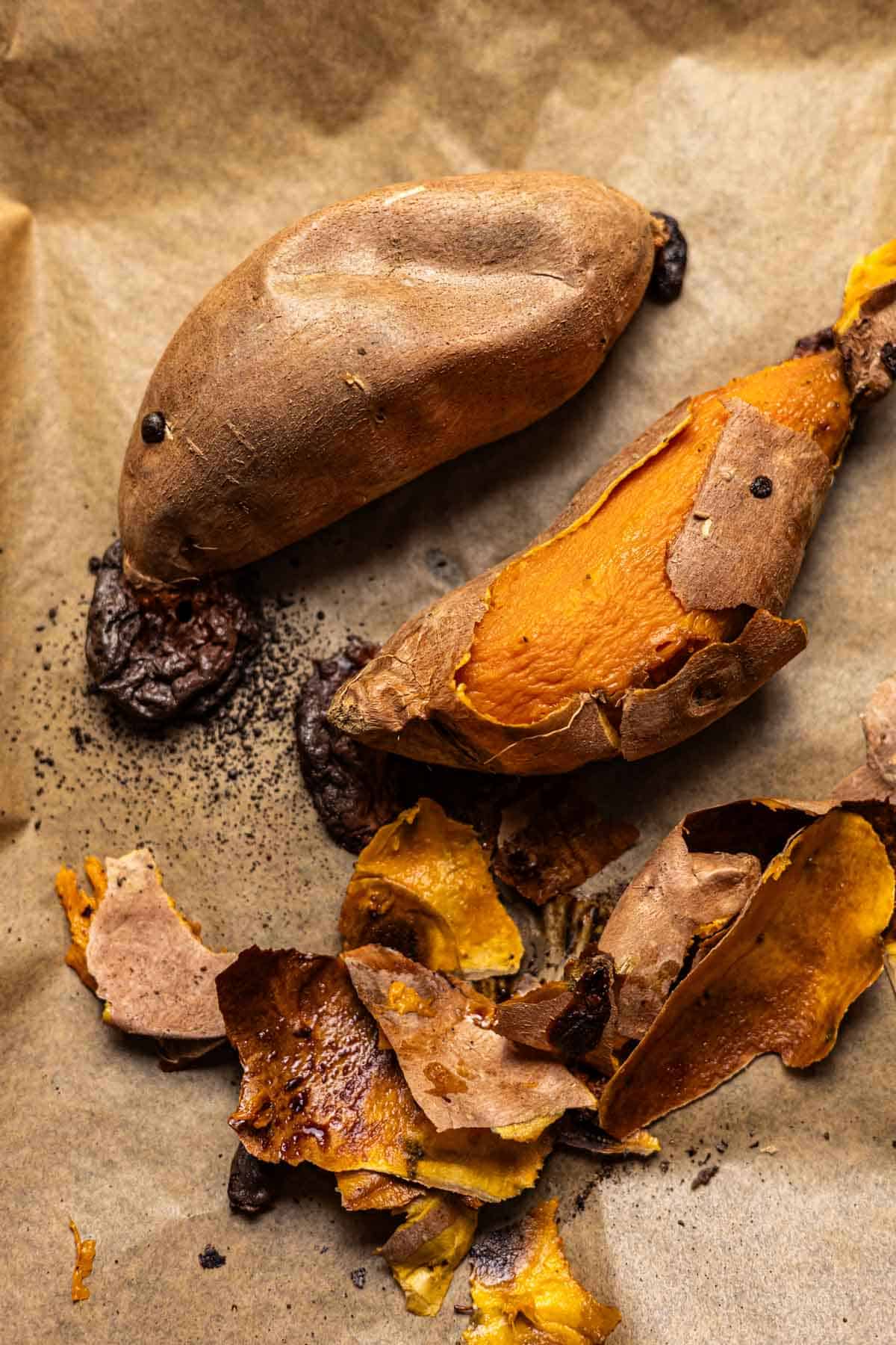 Roasted sweet potatoes on a sheet pan with brown caramelization. 