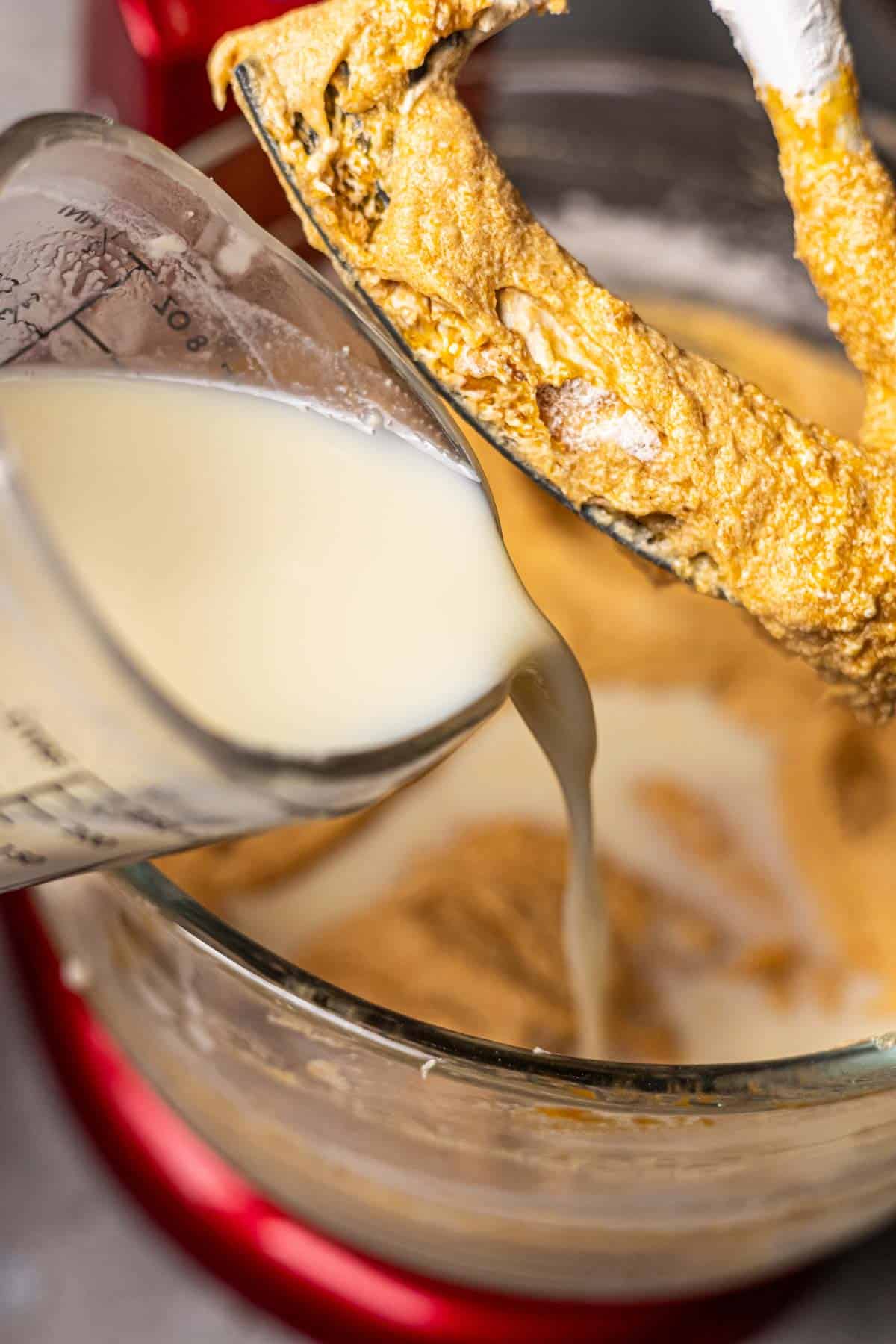 Dry ingredients and milk added to mixing bowl. 