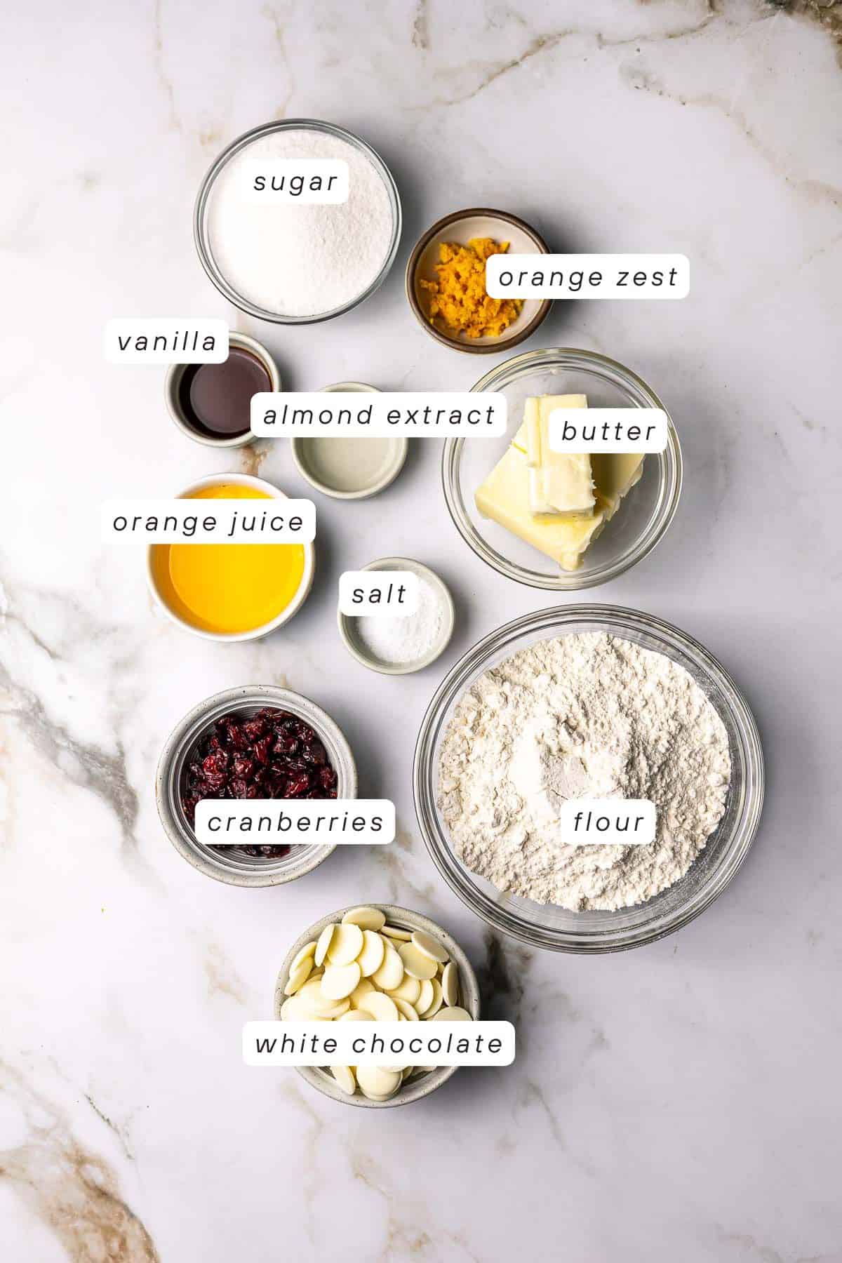 Granulated sugar, orange zest, butter, salt, flour, white chocolate, cranberries, orange juice and vanilla.