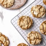 Molasses crinkle cookies on a wire rack.