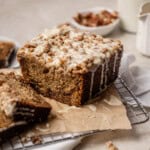 Banana Bread with Streusel Topping topped with maple glaze.