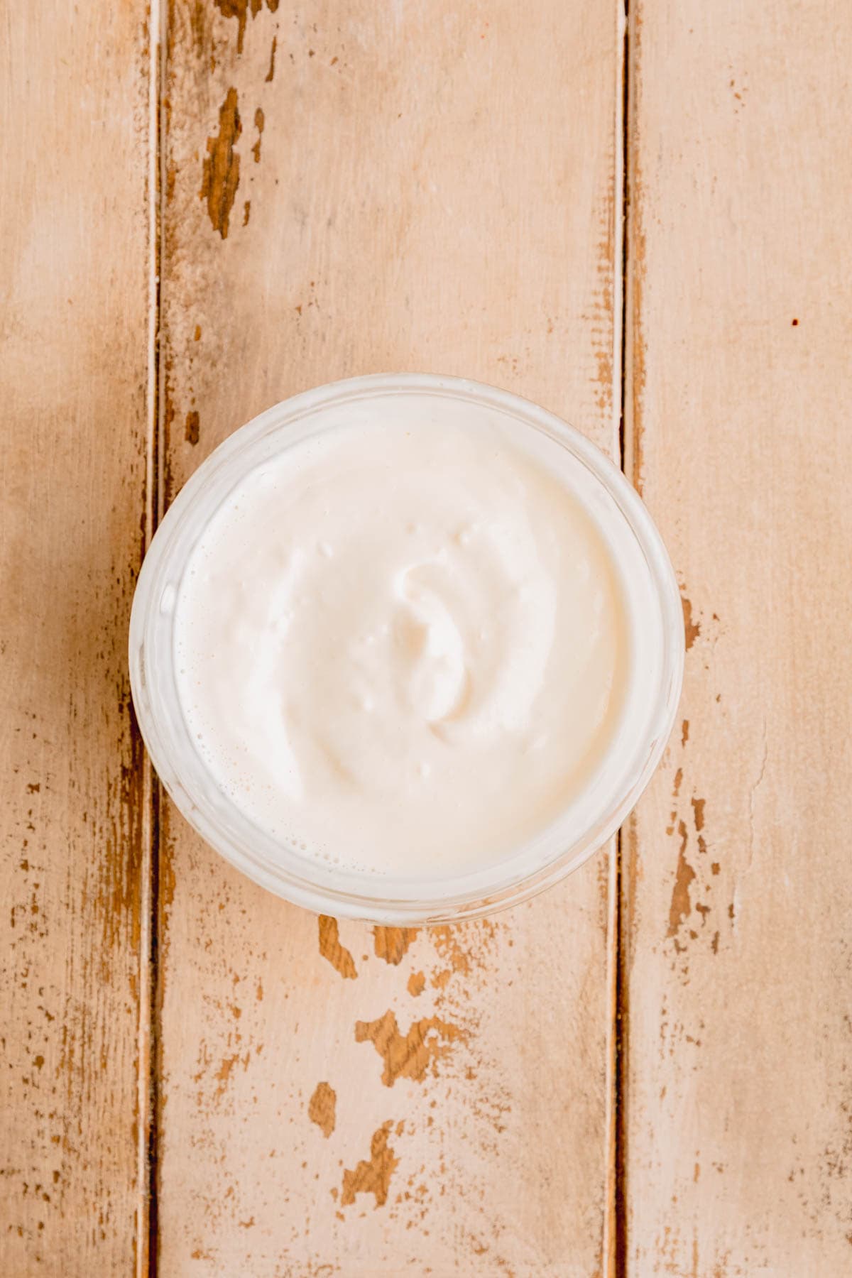 Garlic mayo whisked in a small bowl. 