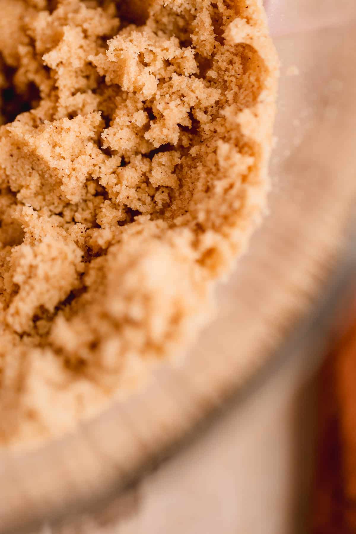 Brown butter and sugars creamed together in a bowl.