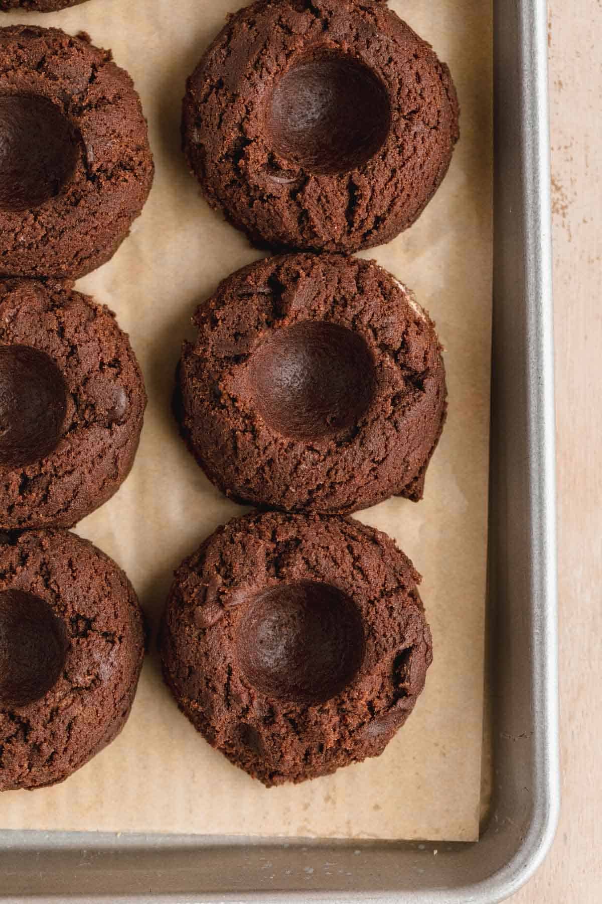 Chocolate cookies with in indent pressed into them for the caramel sauce.