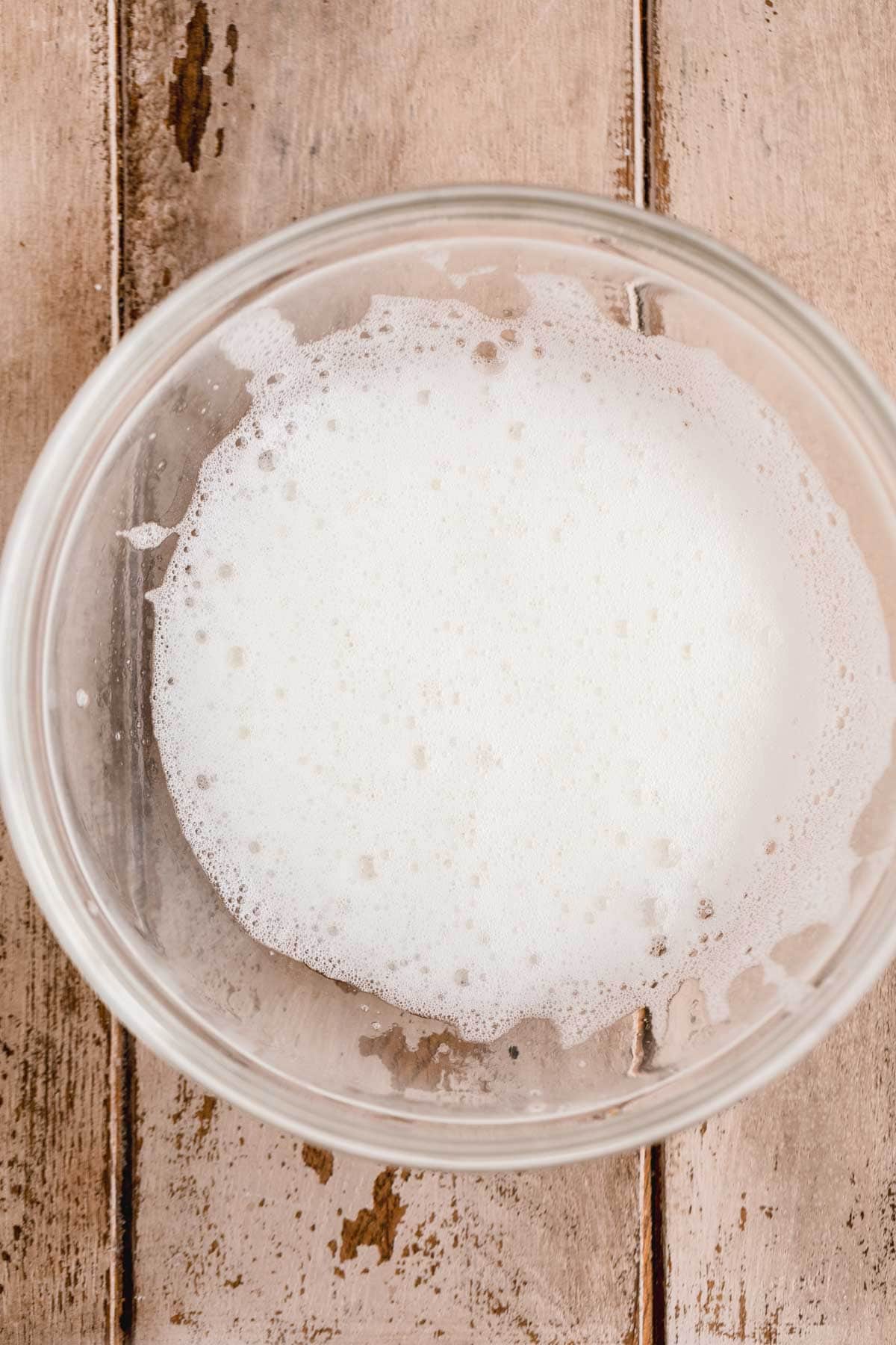 Whipped egg whites in a bowl.