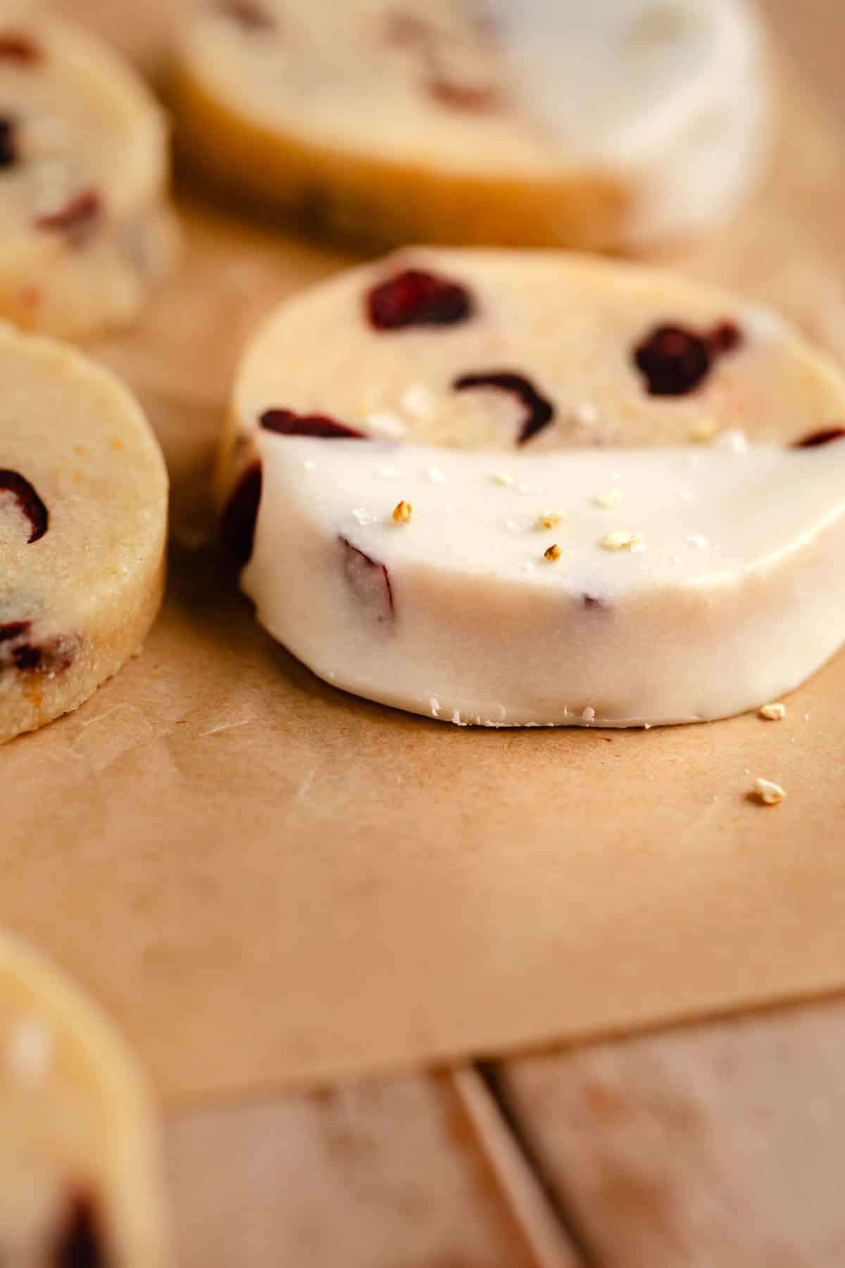 Cranberry Orange Shortbread cookies dipped in white chocolate.