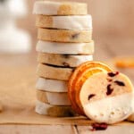A stack of Cranberry Orange Shortbread Cookies.