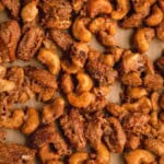 Holiday Candied Nuts featuring cashews and pecans with cinnamon, nutmeg and sugar.