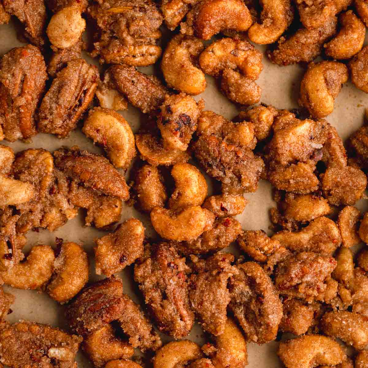 Holiday Candied Nuts featuring cashews and pecans with cinnamon, nutmeg and sugar.