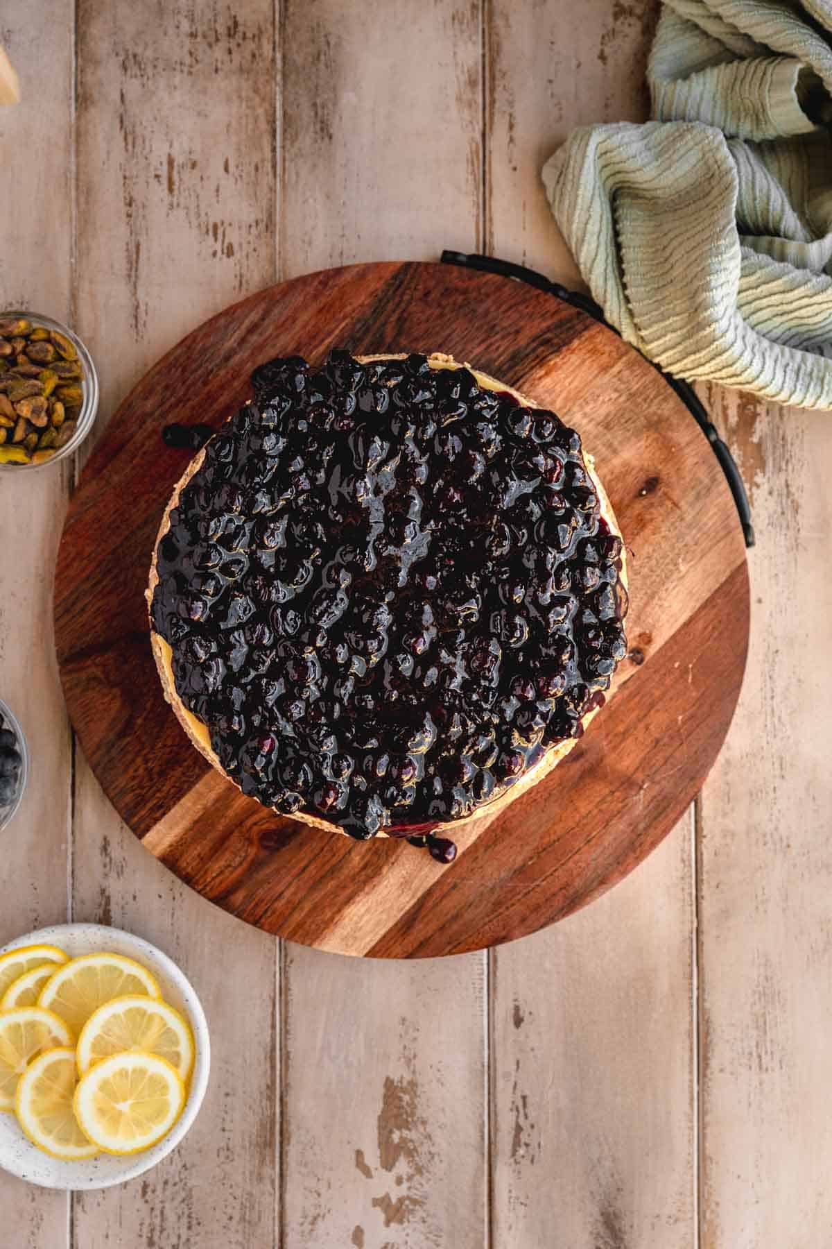 Lemon Blueberry Cheesecake topped with blueberry compote. 