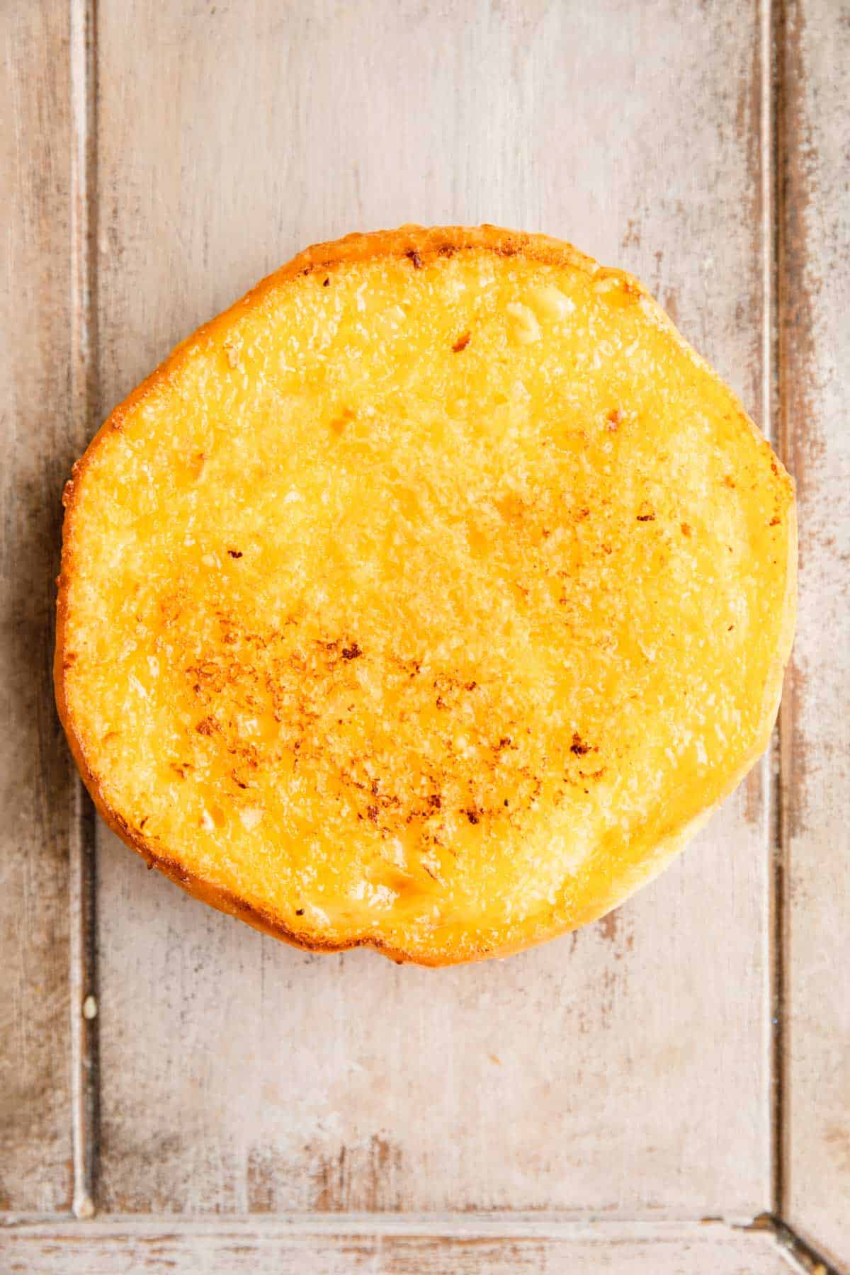Golden brown toasted brioche buns.