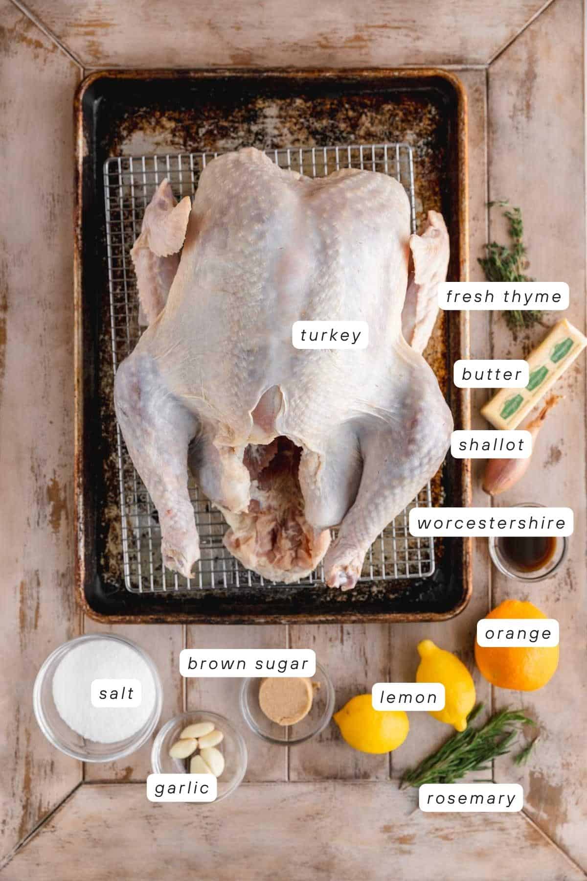 Turkey, butter, thyme rosemary, shallot, worcestershire sauce, orange, lemon, rosemary, brown sugar, garlic and salt.