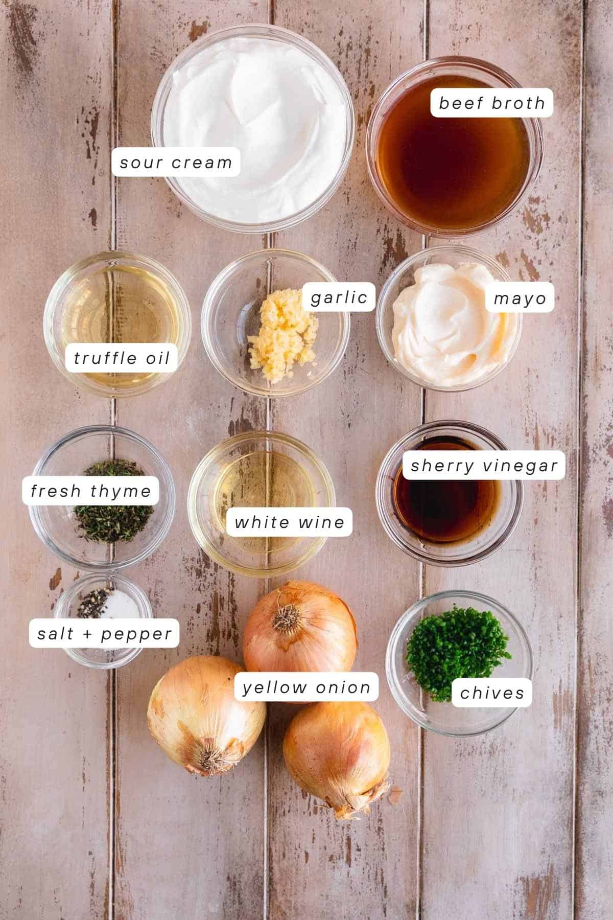 Sour cream, beef broth, mayo, garlic, truffle oil, fresh thyme, white wine, sherry vinegar, salt, pepper, yellow onions and chives.
