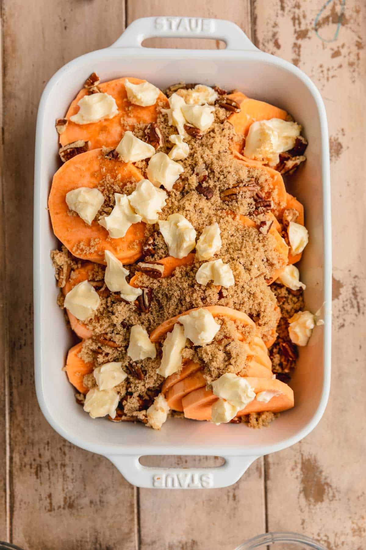 Sweet potatoes topped with brown sugar, spices and butter. 